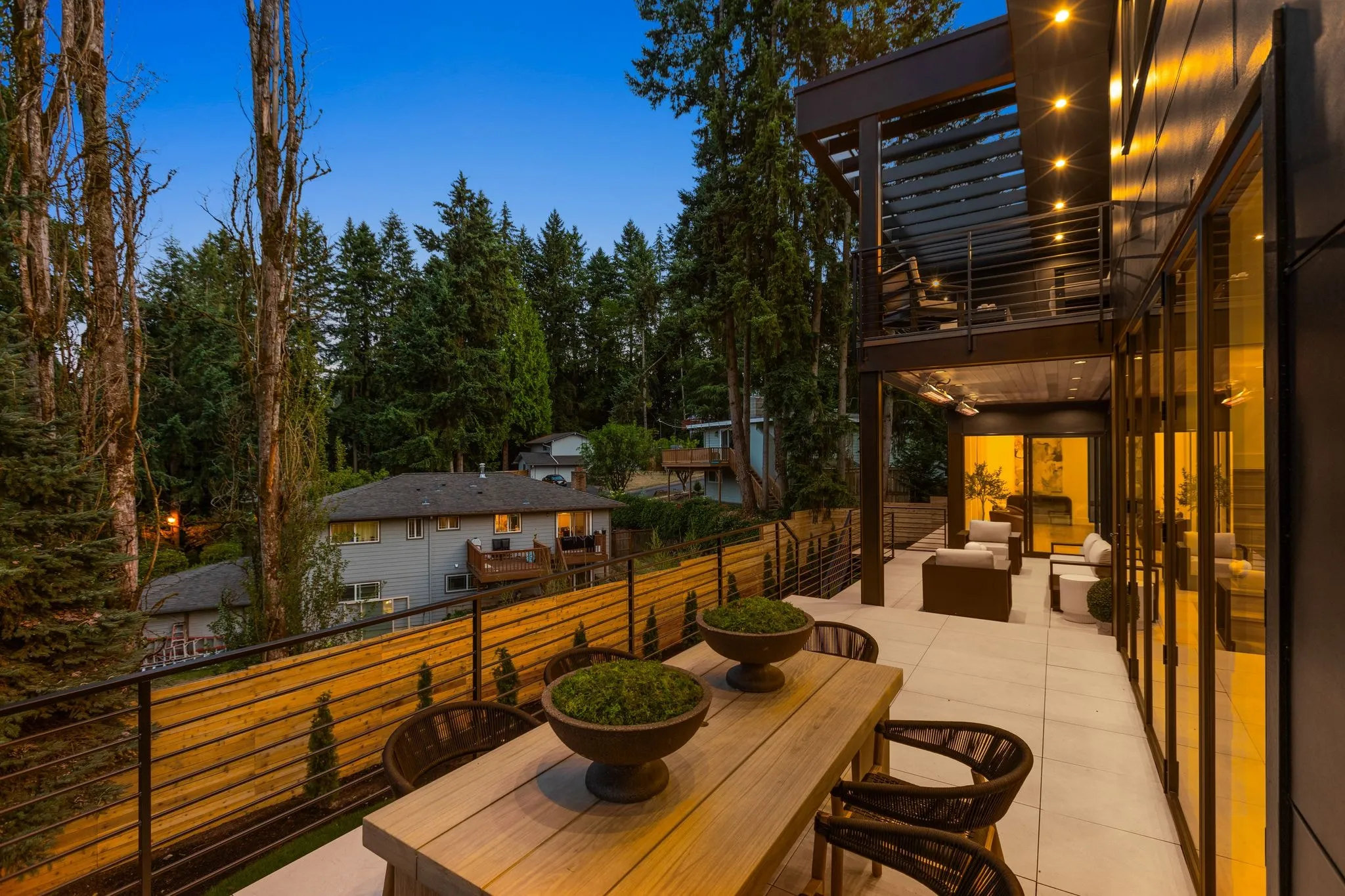 Exterior glowing at twilight, photographed by ACRE Seattle for a Zillow Showcase listing